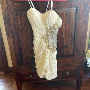 Elegant Cream Dress with Gold Accents